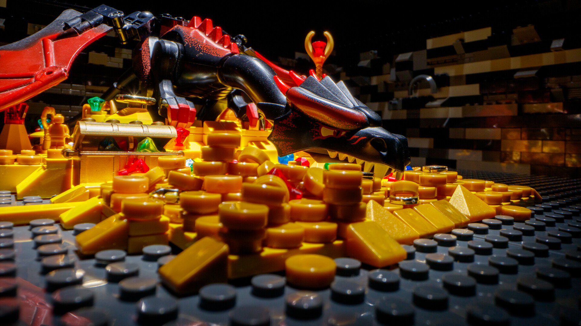 Still from Bold Gold &mdash; a LEGO dragon perched atop a hoard of golden bricks